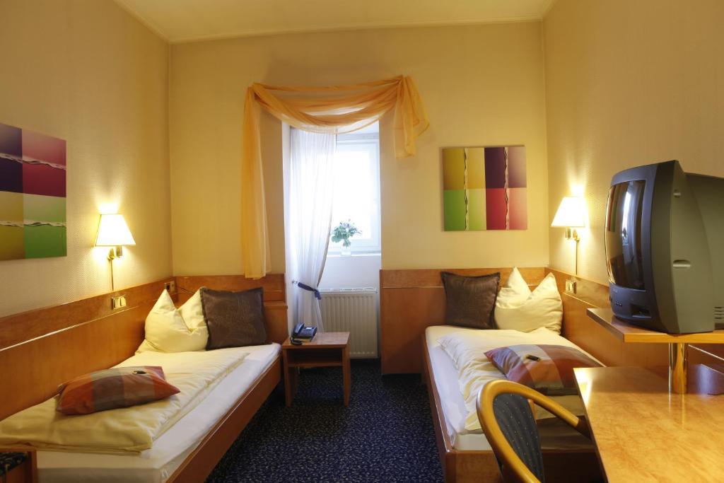 Hotel Villa Brenner Grünstadt Pokoj fotografie